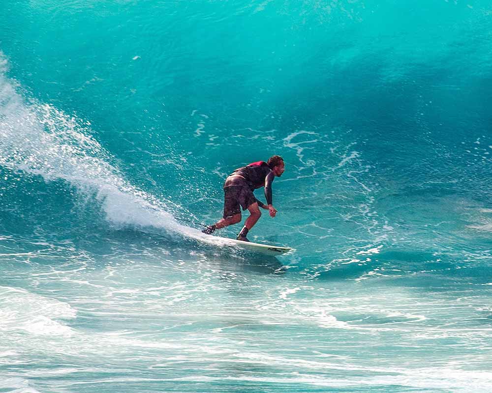Surfer on a wave in the sea